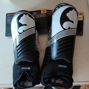 Puma Kids' Black and White Shin Guards (2 Pair.  1Sm And 1Med)
